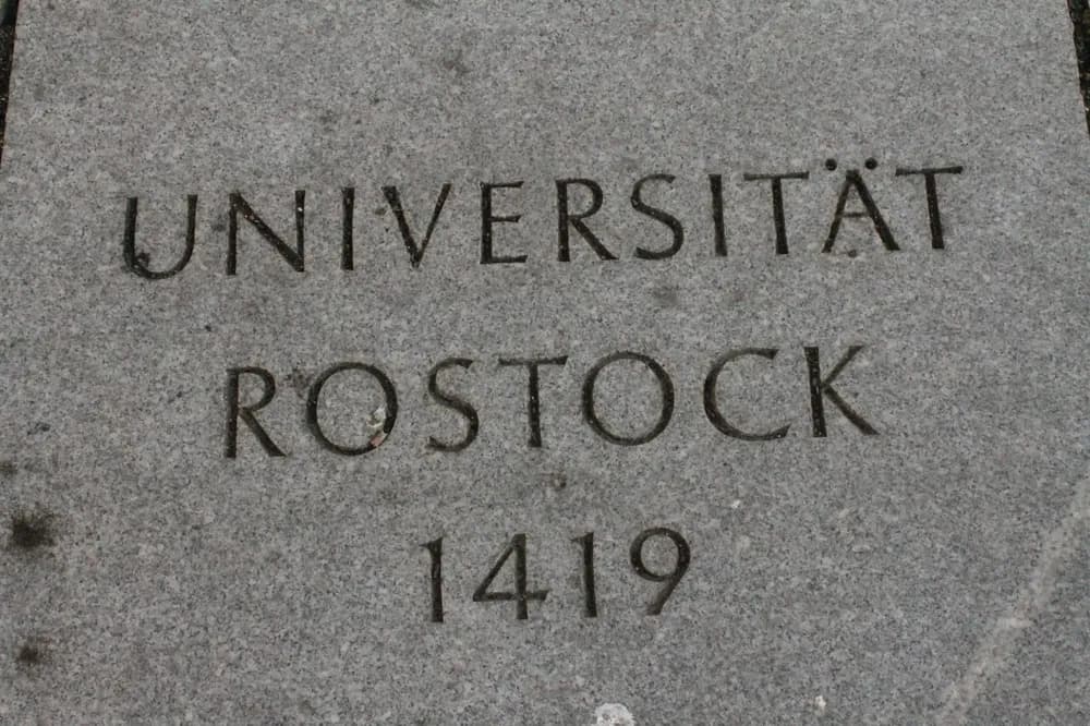 Memorial stone to the foundation of Rostock University, quadrangle of Wittenberg University — Rostock